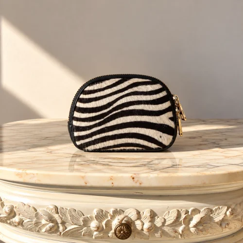 MONEDERO PIEL ANIMAL PRINT - Imagen 3